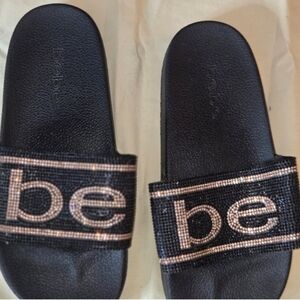 Bebe Black Sandals with Gold Detailing